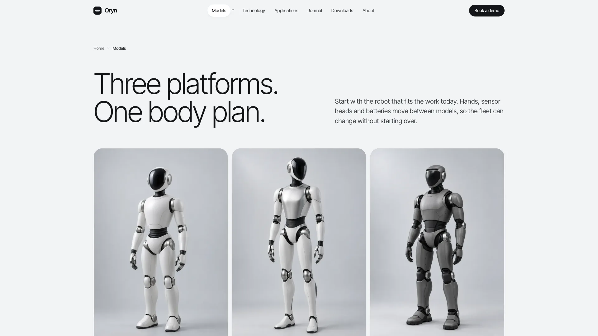 Models page with three humanoid robots on silver studio backdrops